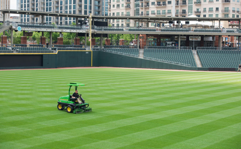 Matt Parrott maintaining Charlotte Knights Field - John Deere